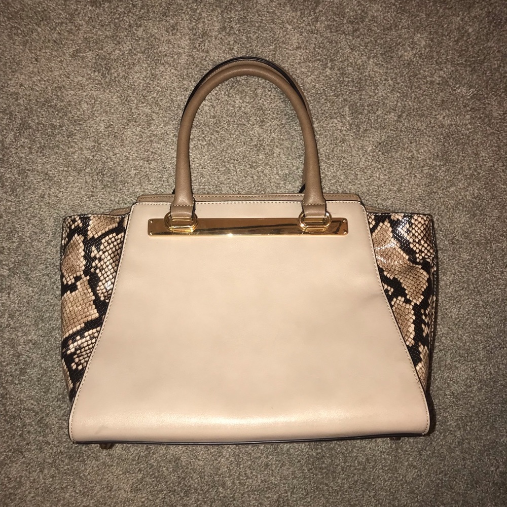 Tan and snakeskin purse